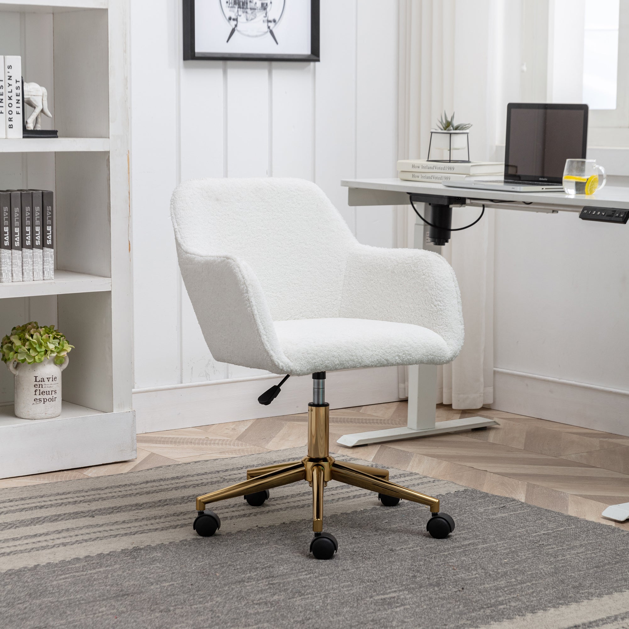 White teddy office chair side profile with 360° wheels