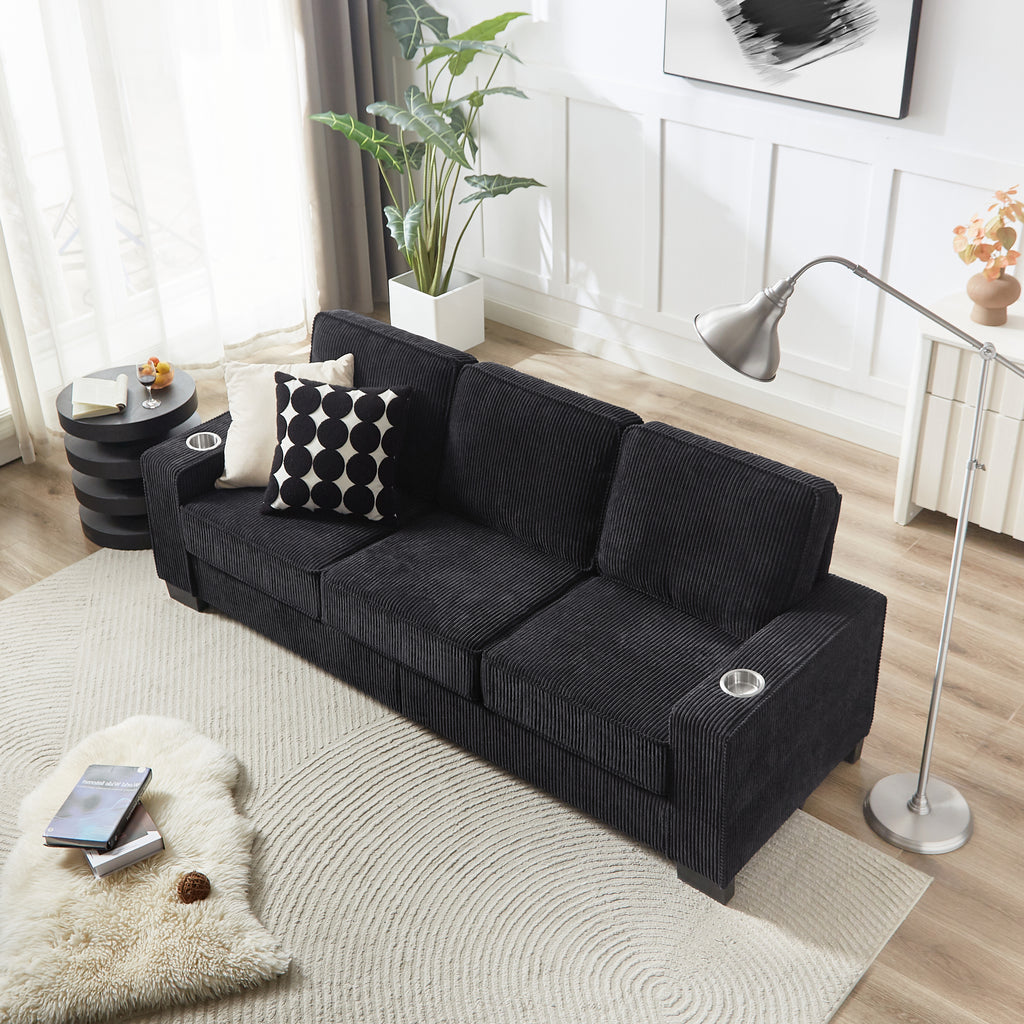 Black corduroy couch wide-wale fabric texture close-up