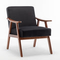 Black velvet mid-century wingback accent chair — front view