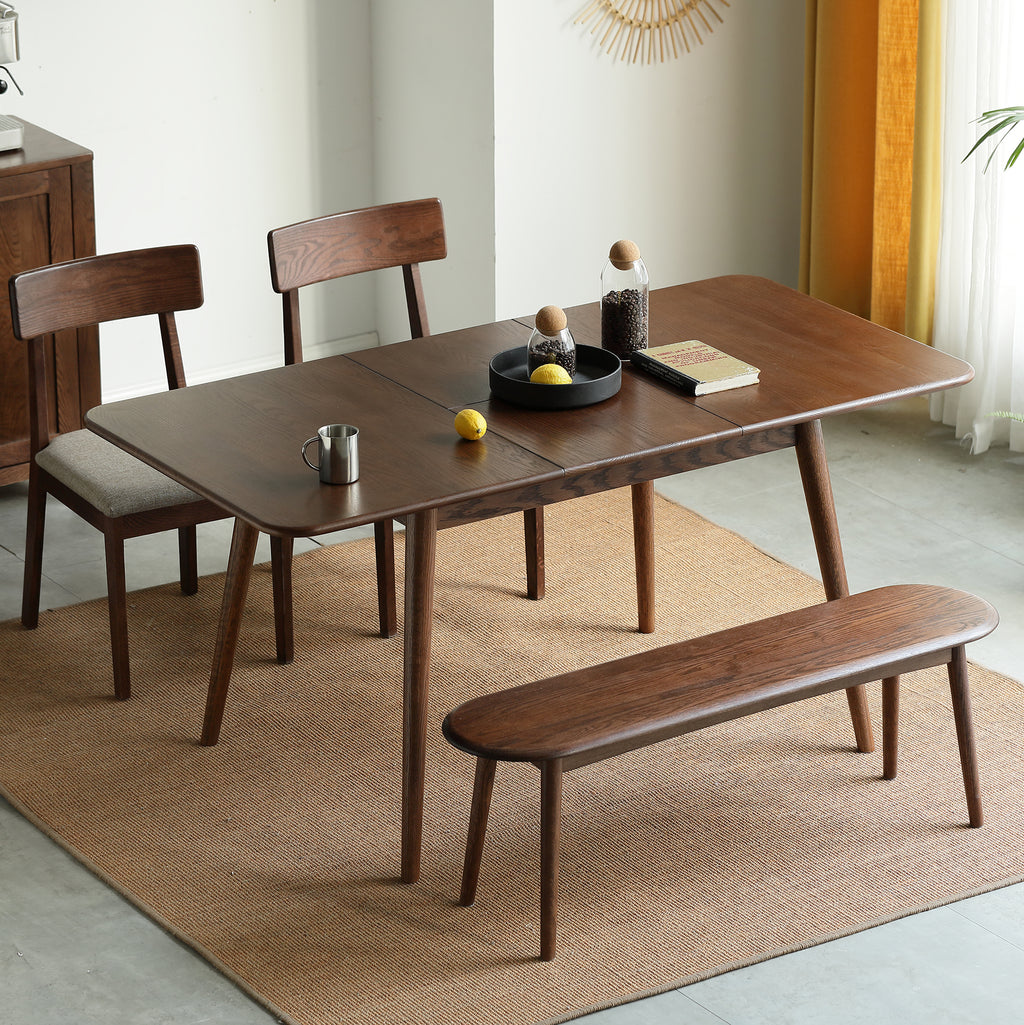 Walnut dining table in modern dining room setting