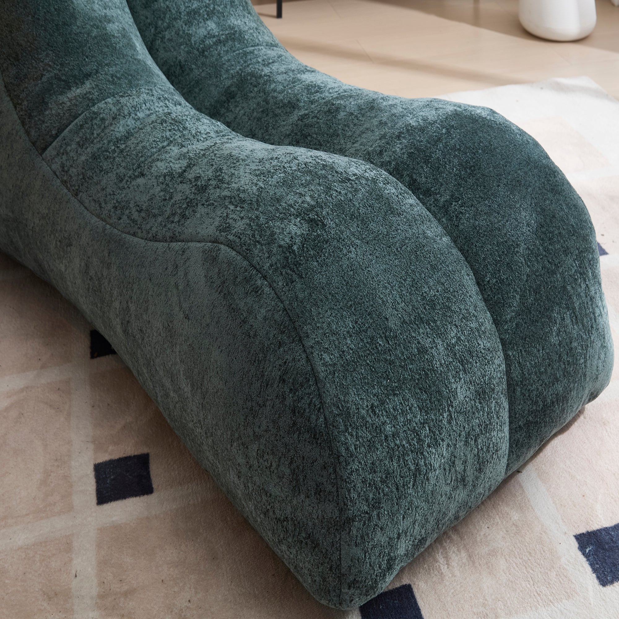 Light blue bean bag sofa chair — profile view