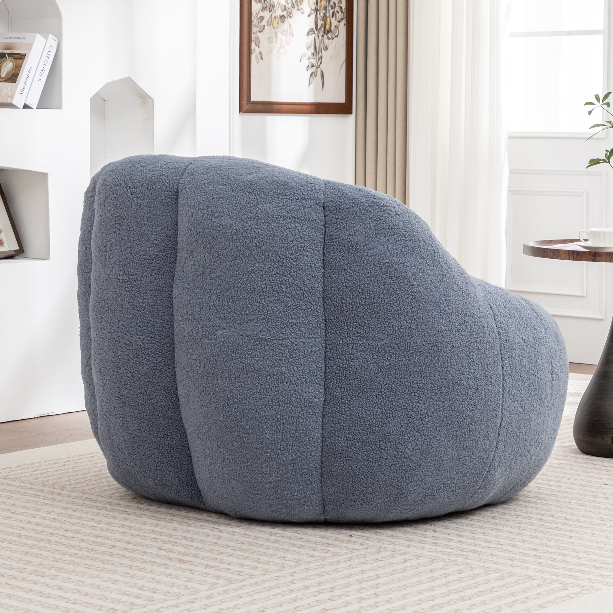 Tufted light blue bean bag lounge chair product photo