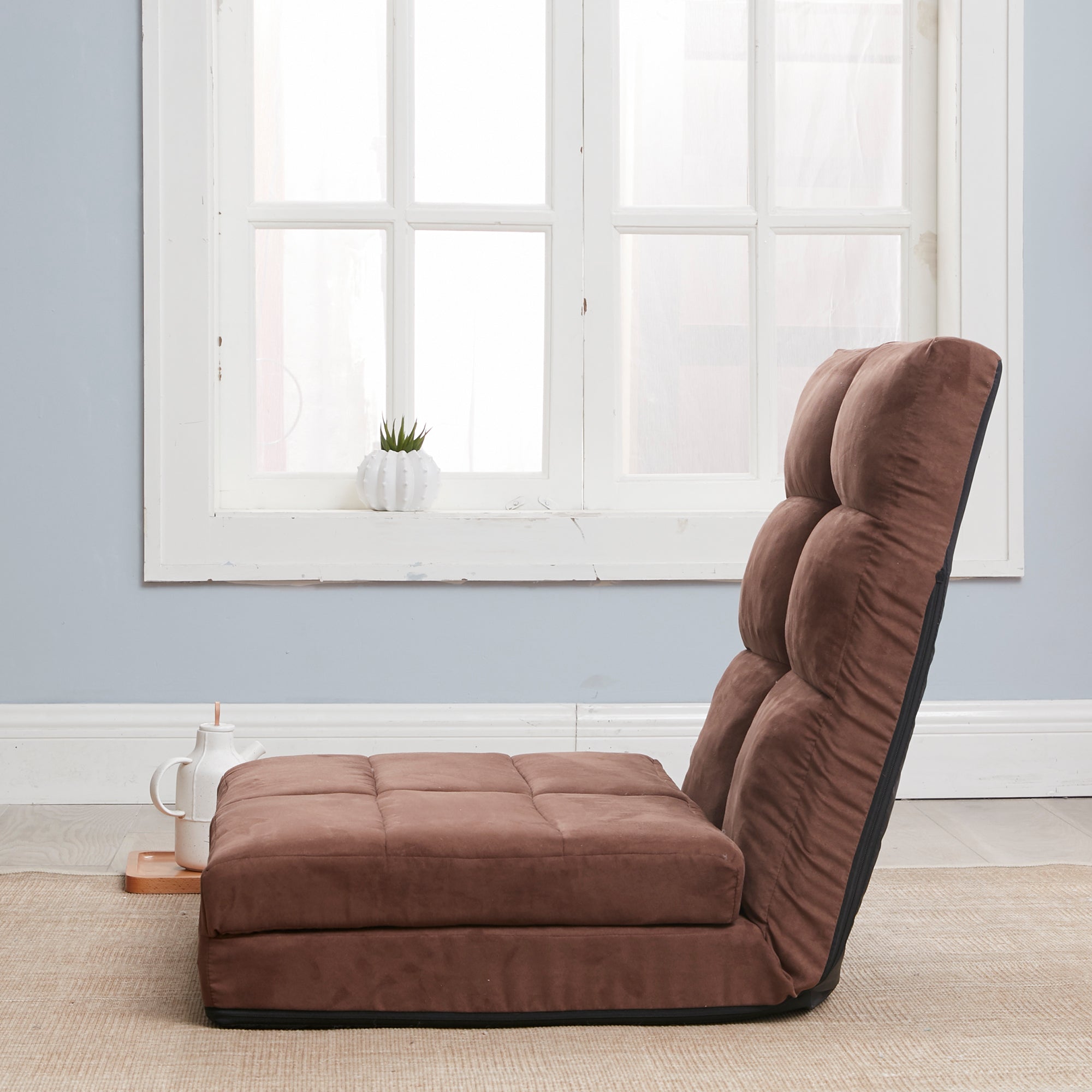 Steel frame construction detail on brown sofa bed