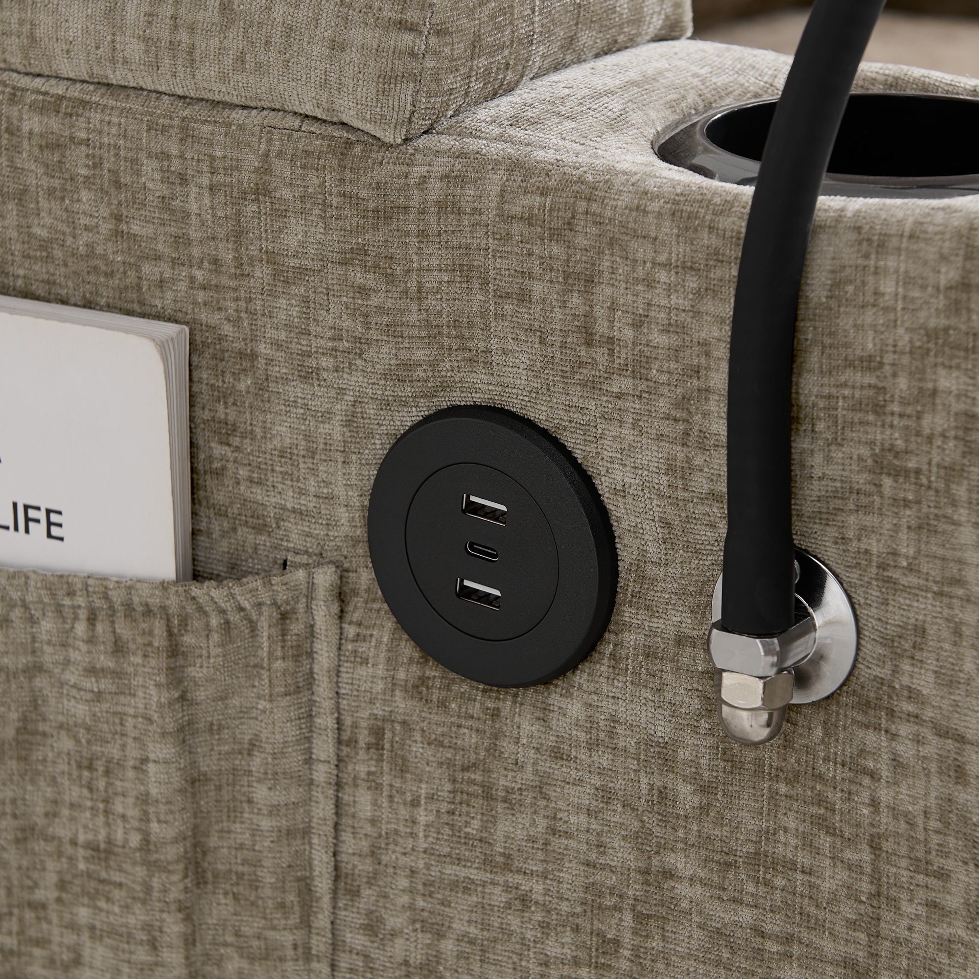 Hidden armrest storage compartment detail