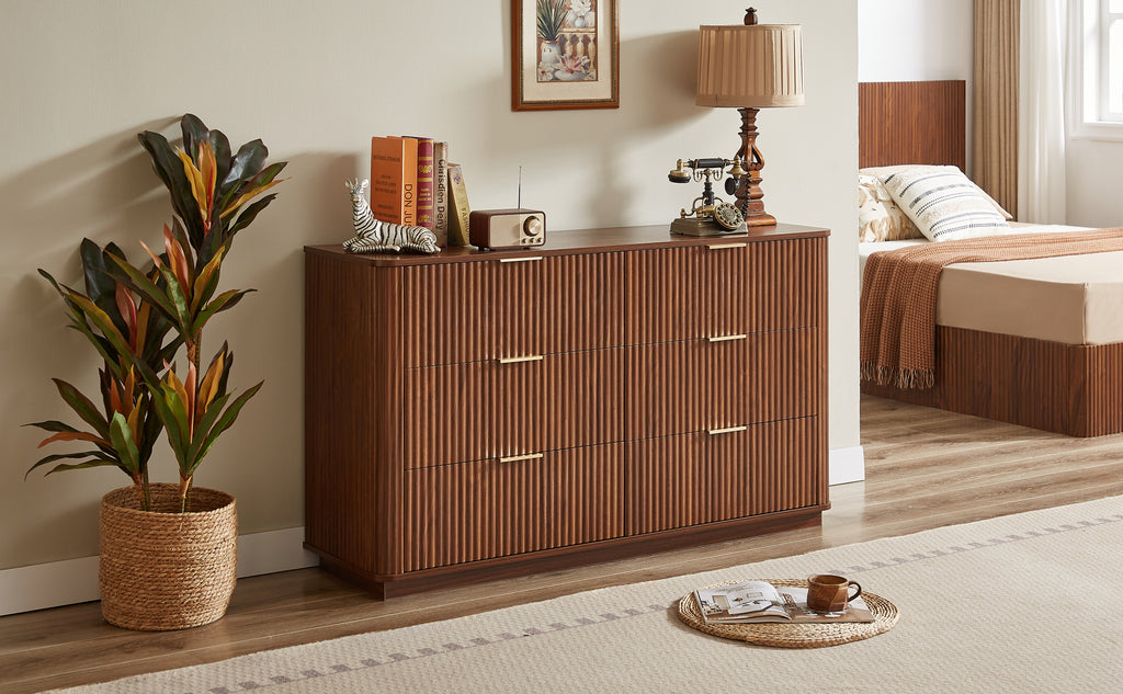 Curved wave design dresser in bedroom setting