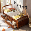 Walnut twin platform storage bed with six drawers — front view