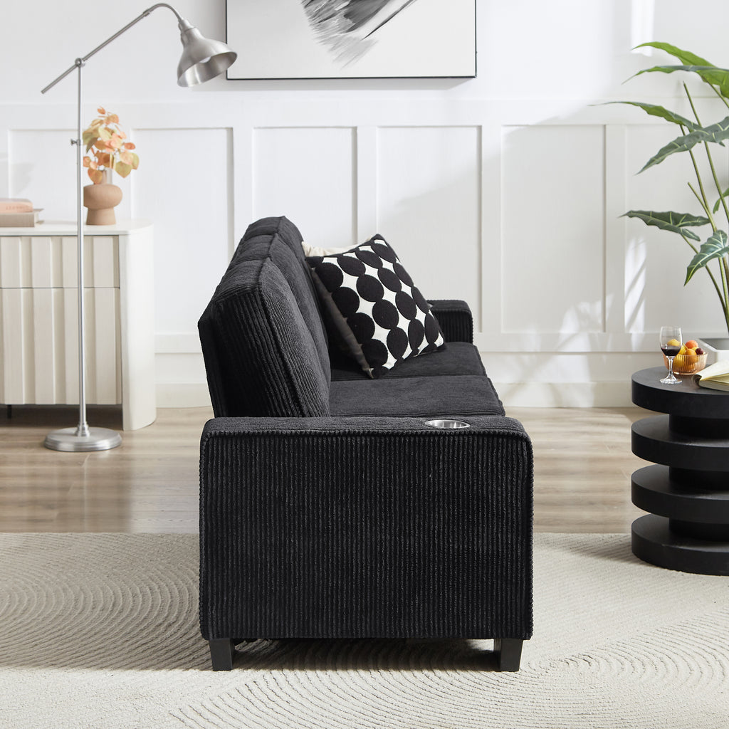 Integrated cup holder in black corduroy sofa armrest detail