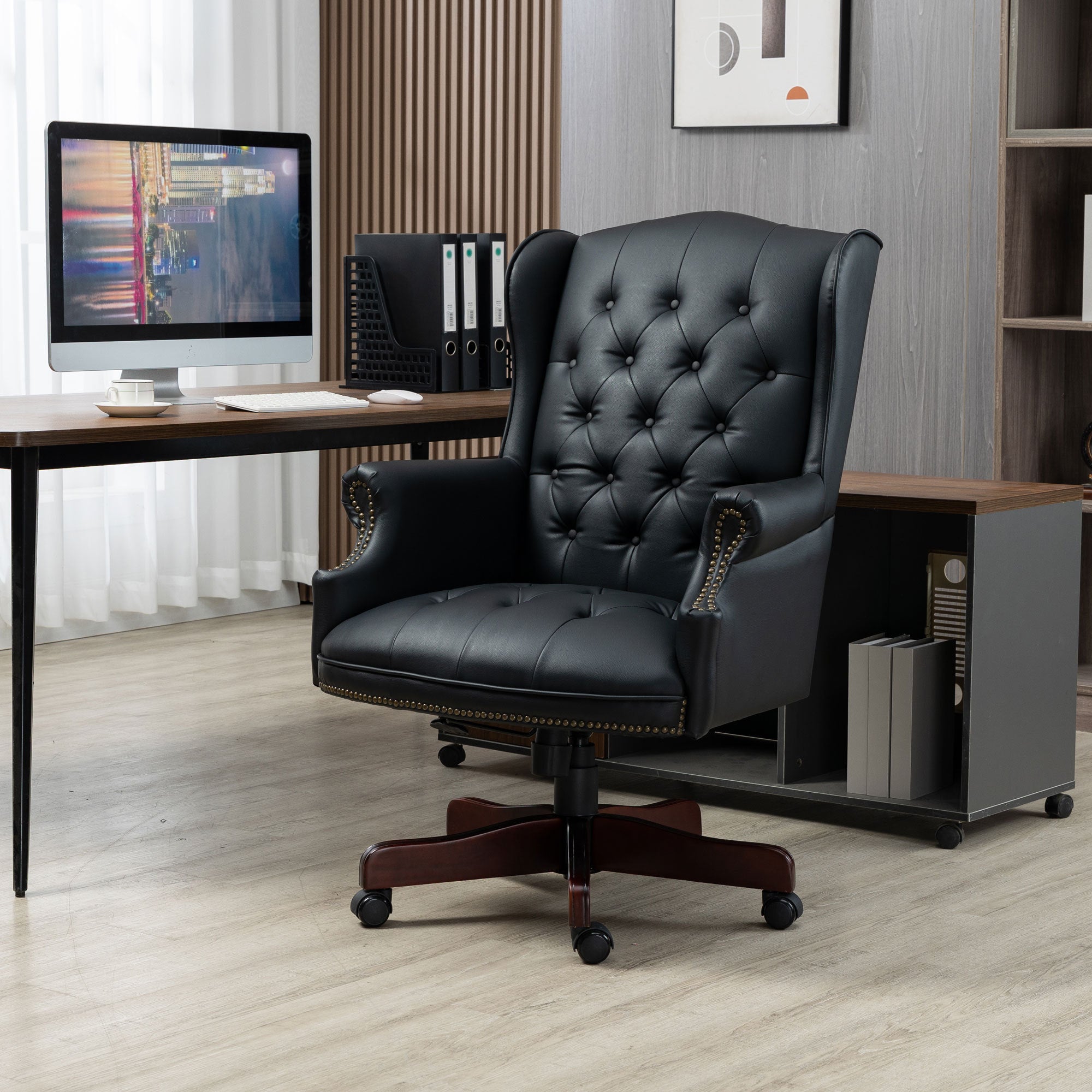 Black executive office chair — front view