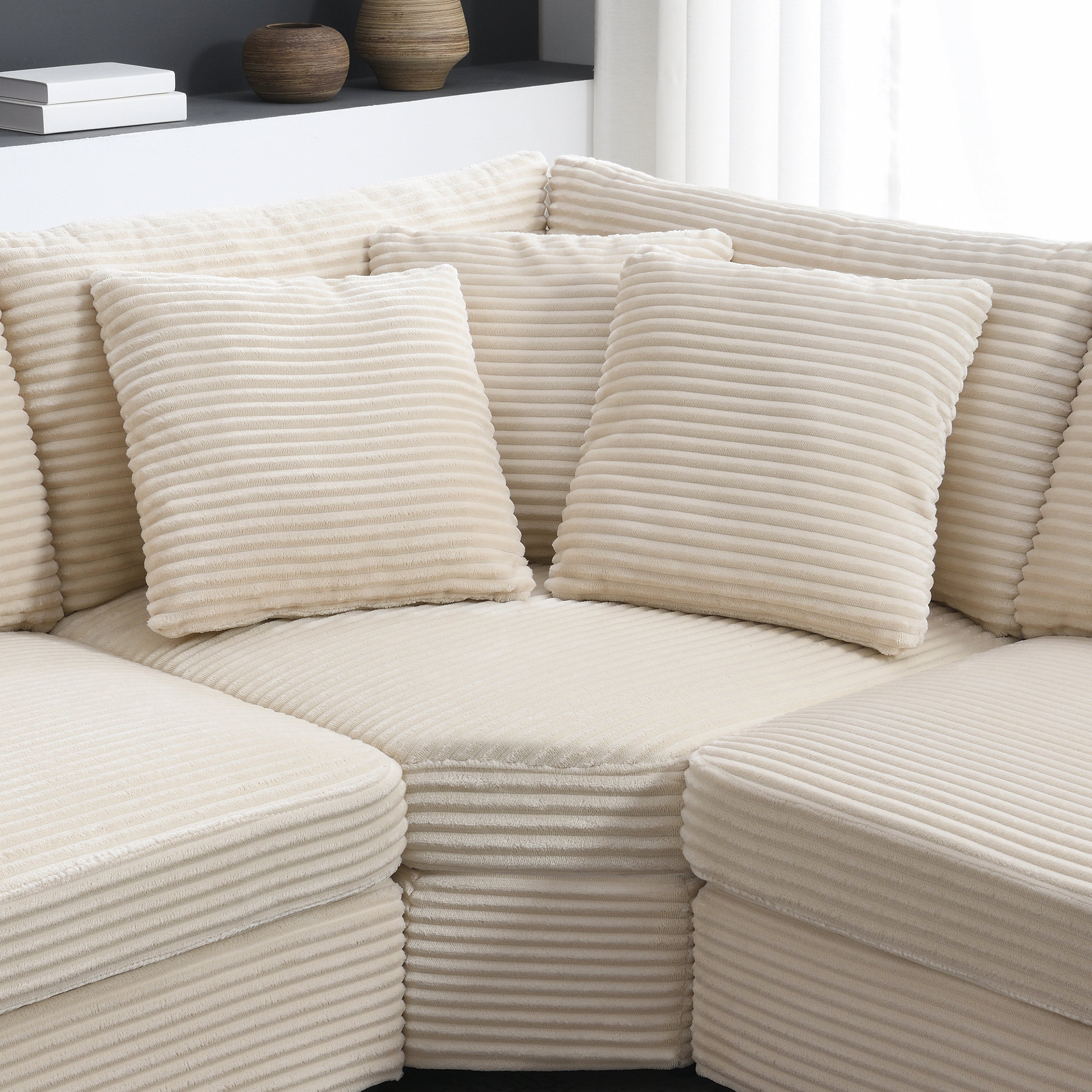 Beige corduroy sectional sofa side angle modular pieces