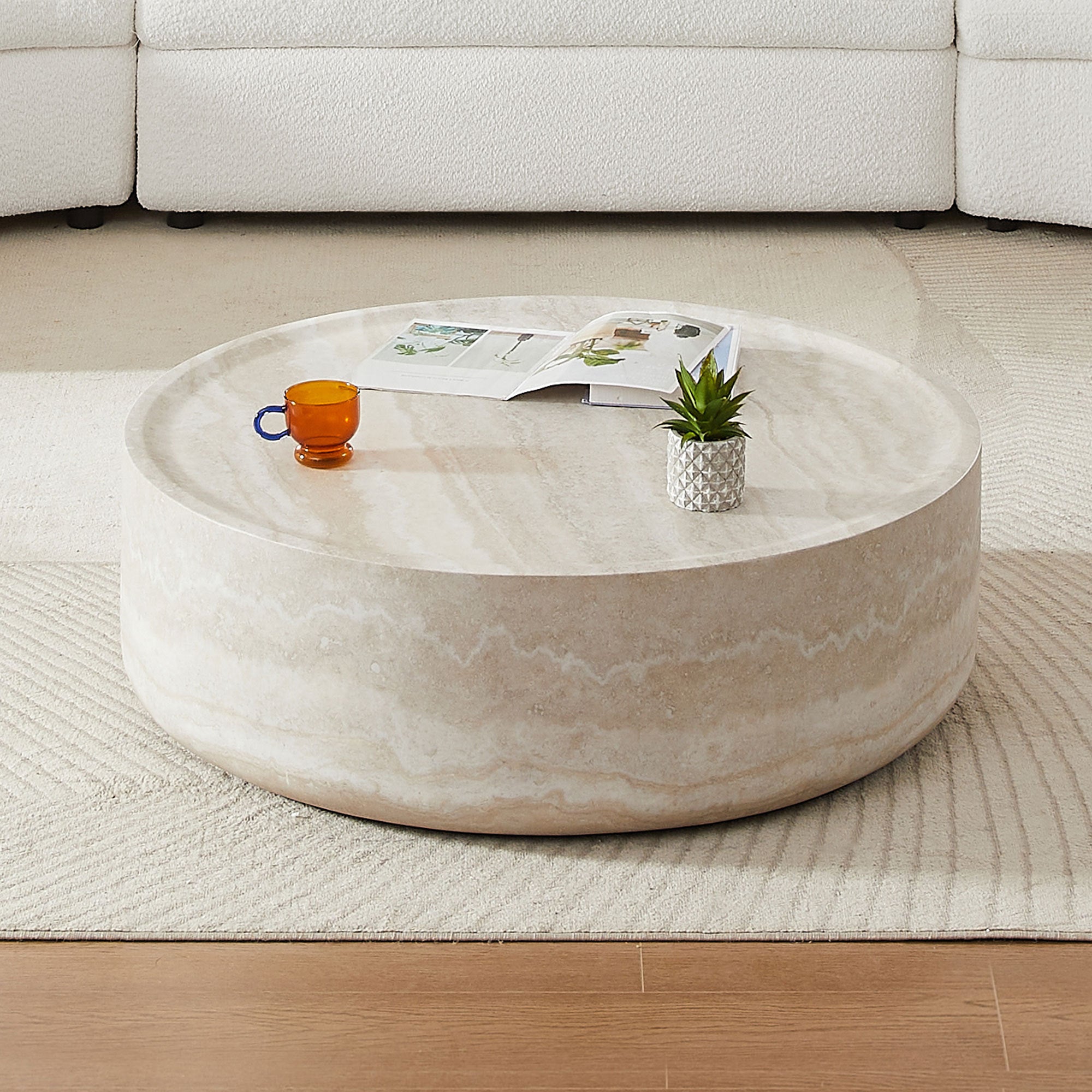 Round faux travertine coffee table fiberglass — front view