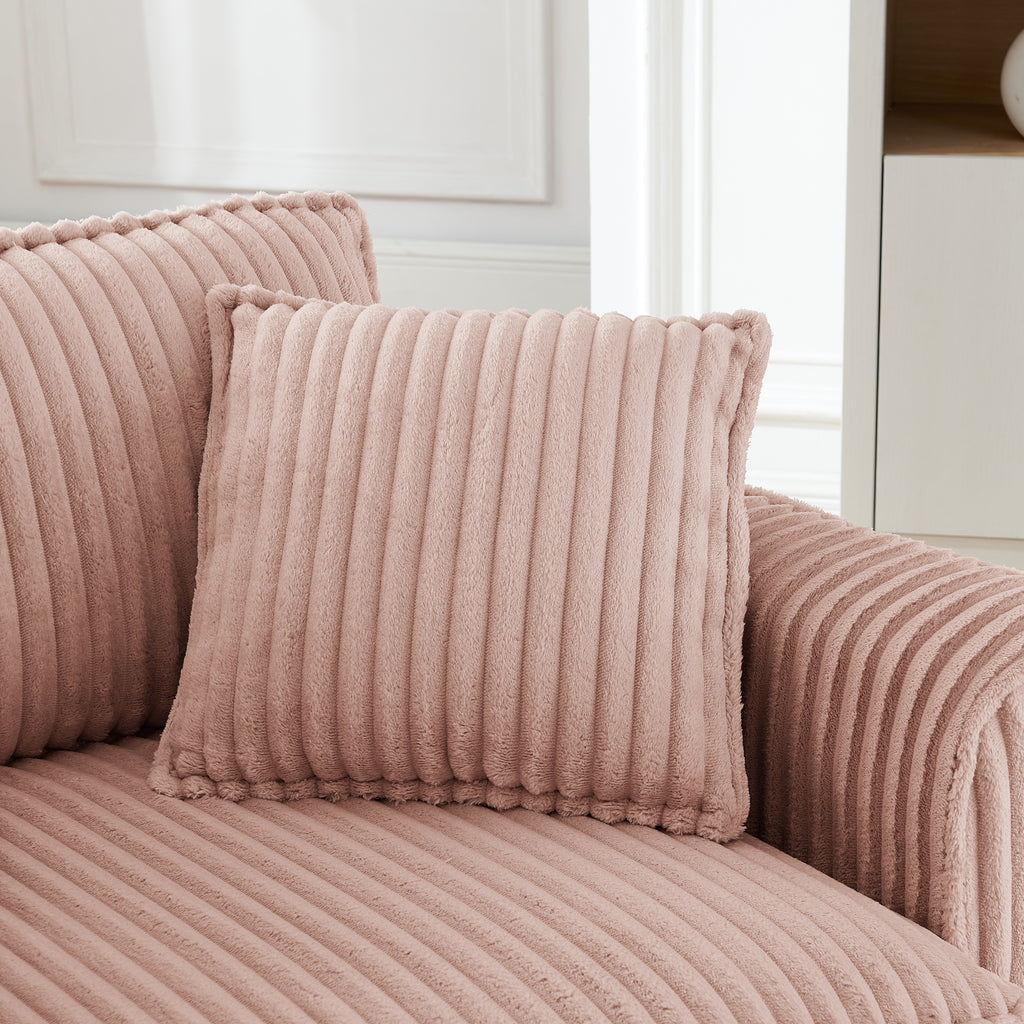 Pink lazy sofa chair with armrests — side profile