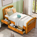 Oak twin platform storage bed with 6 drawers — front view