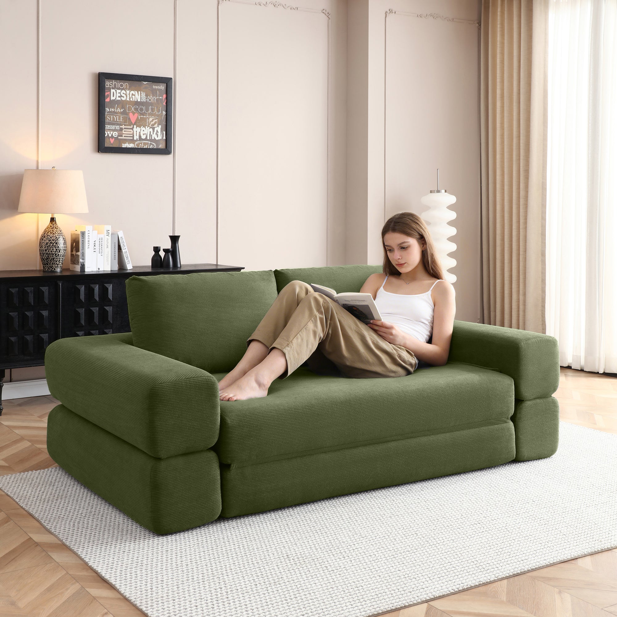 Foldable sofa bed converted to lounge chair configuration