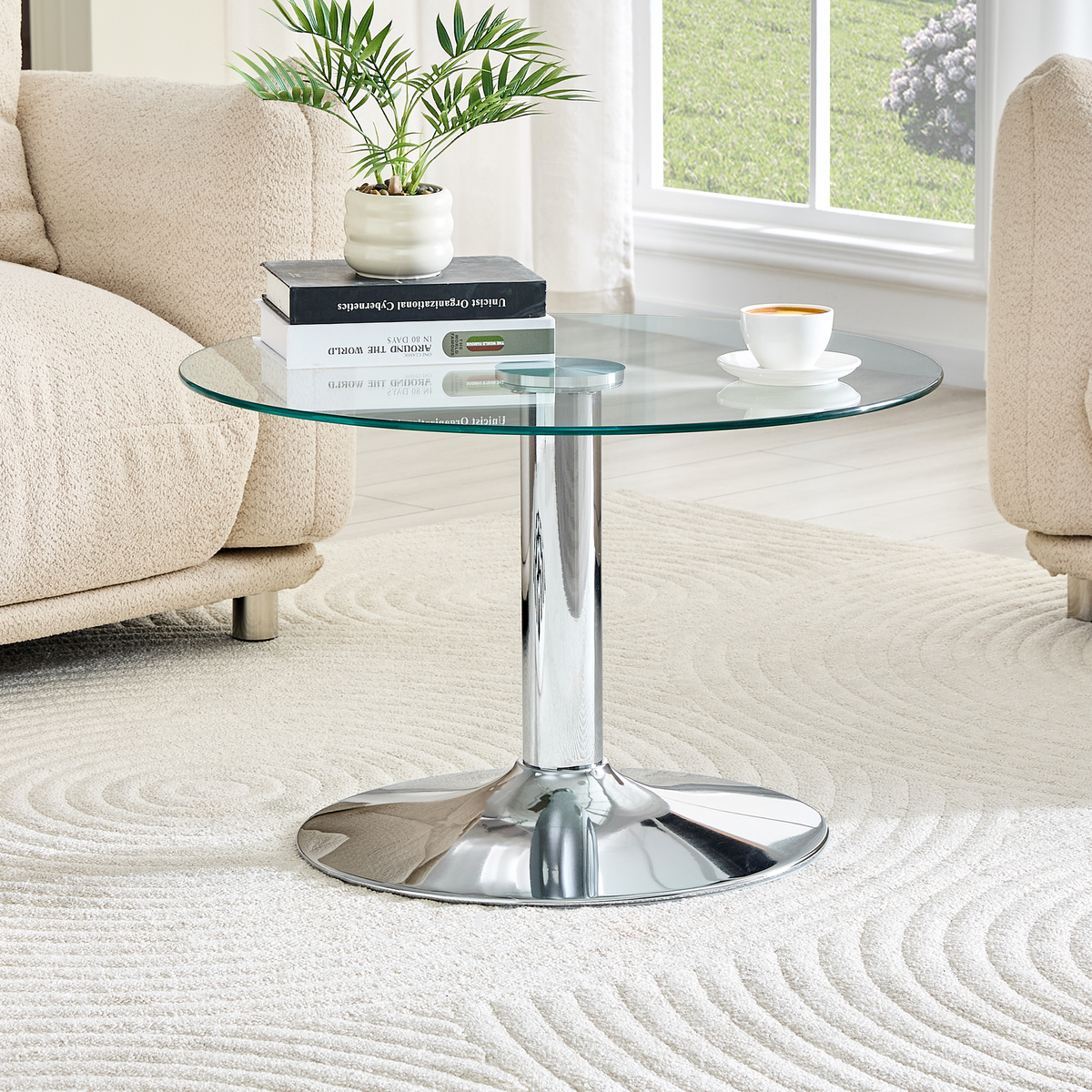 27.5-inch diameter round tempered glass coffee table. 17.7 inches high, supported by a silver metal base, with a light luxury edge.
