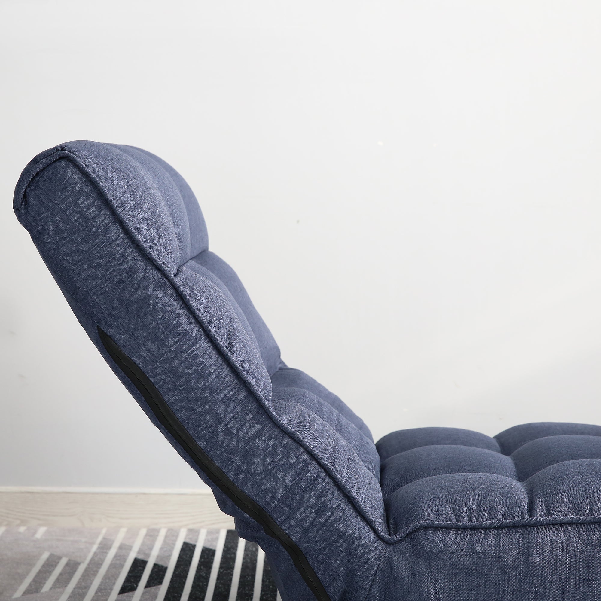 Navy floor reclining sofa chair reading position