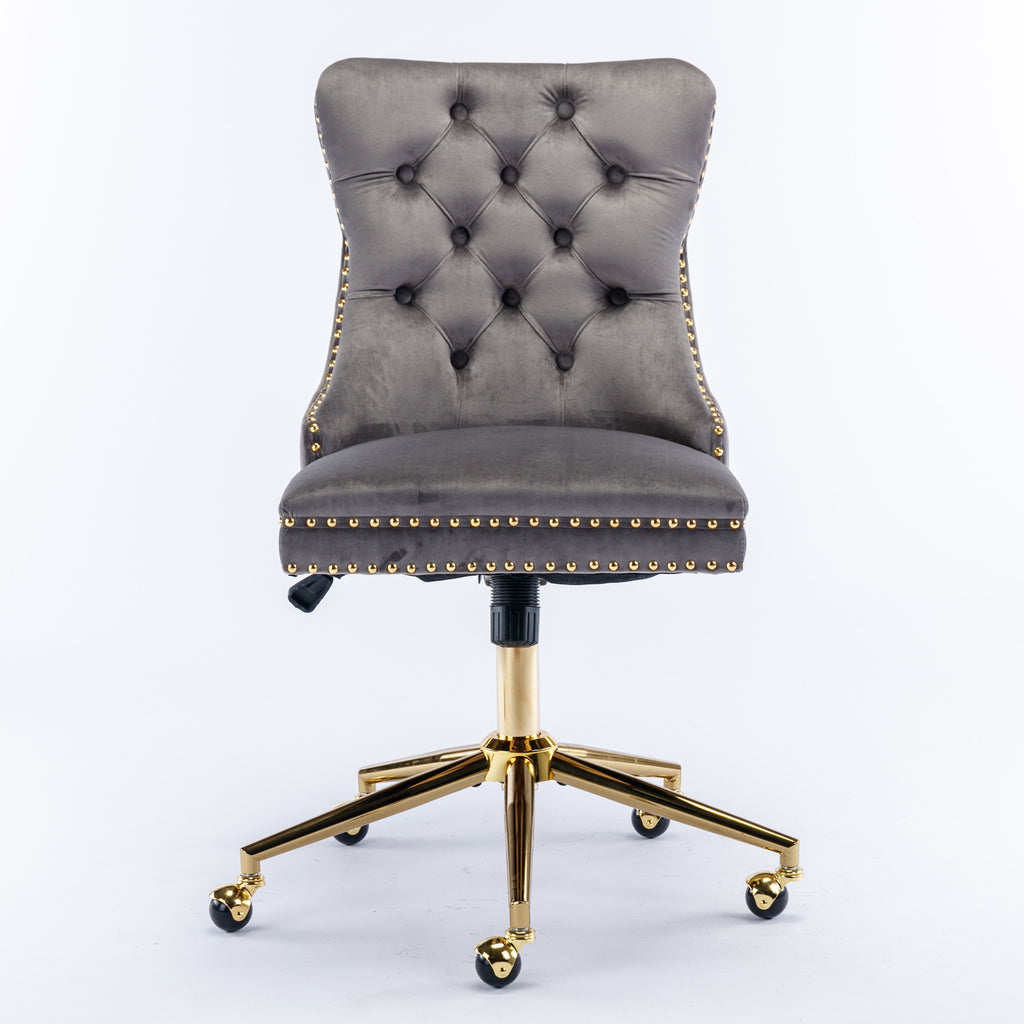 Gray office chair with gold metal legs and swivel wheels