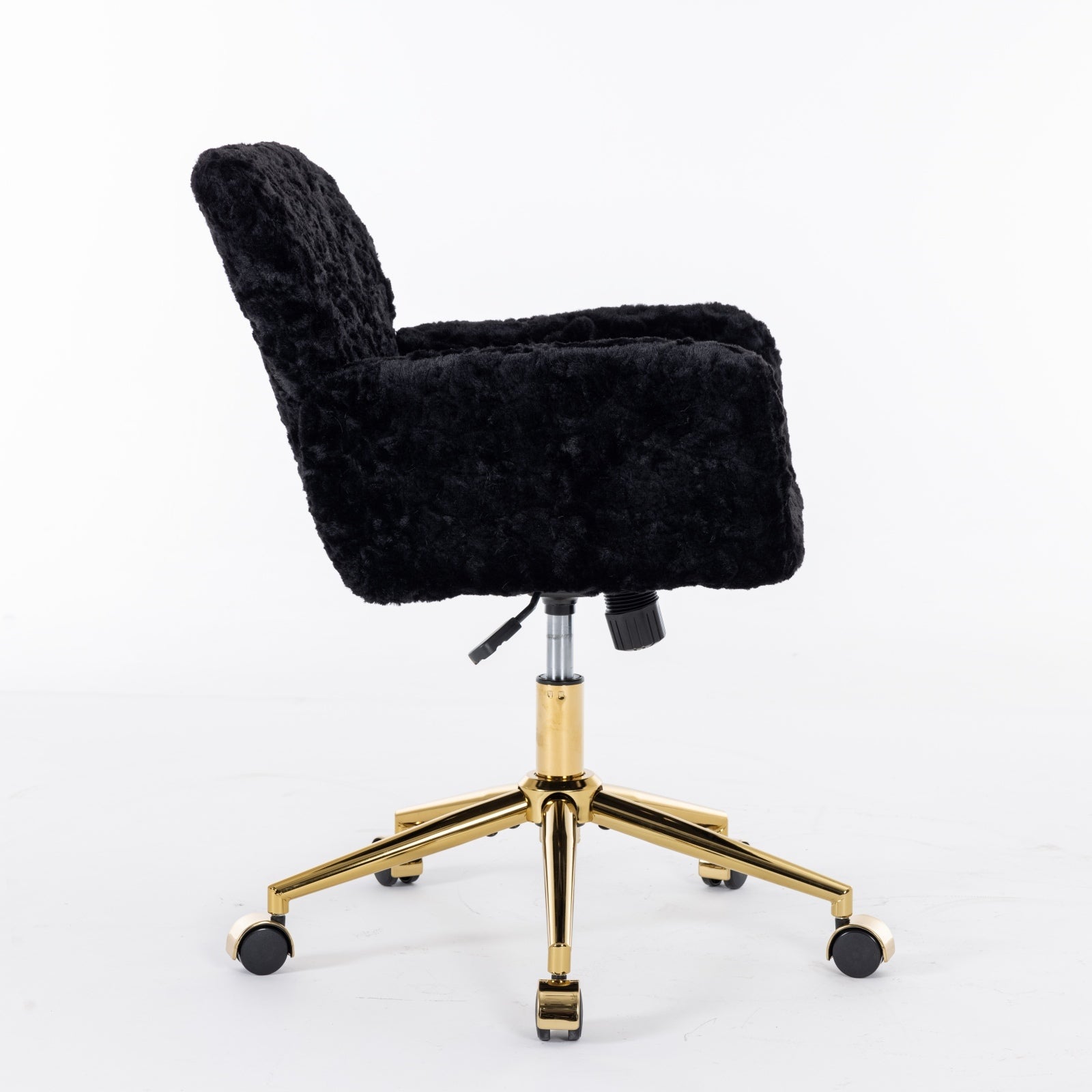 Black office chair side profile with gold metal base