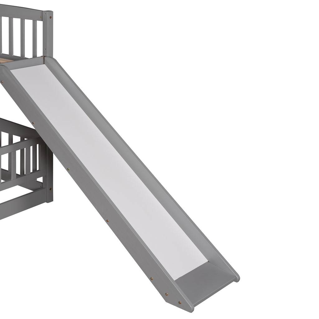 Full over full low bunk bed in gray — bedroom setting