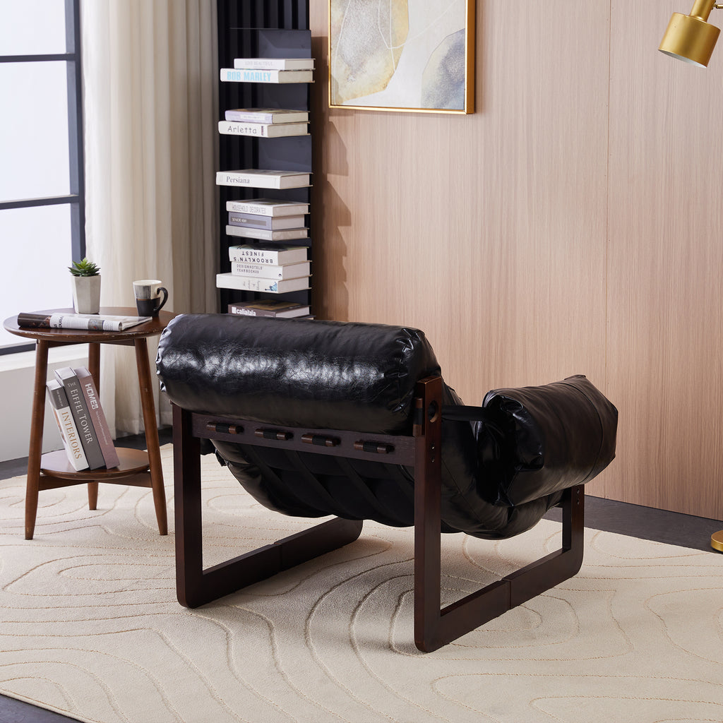 Antique black lounge chair back view