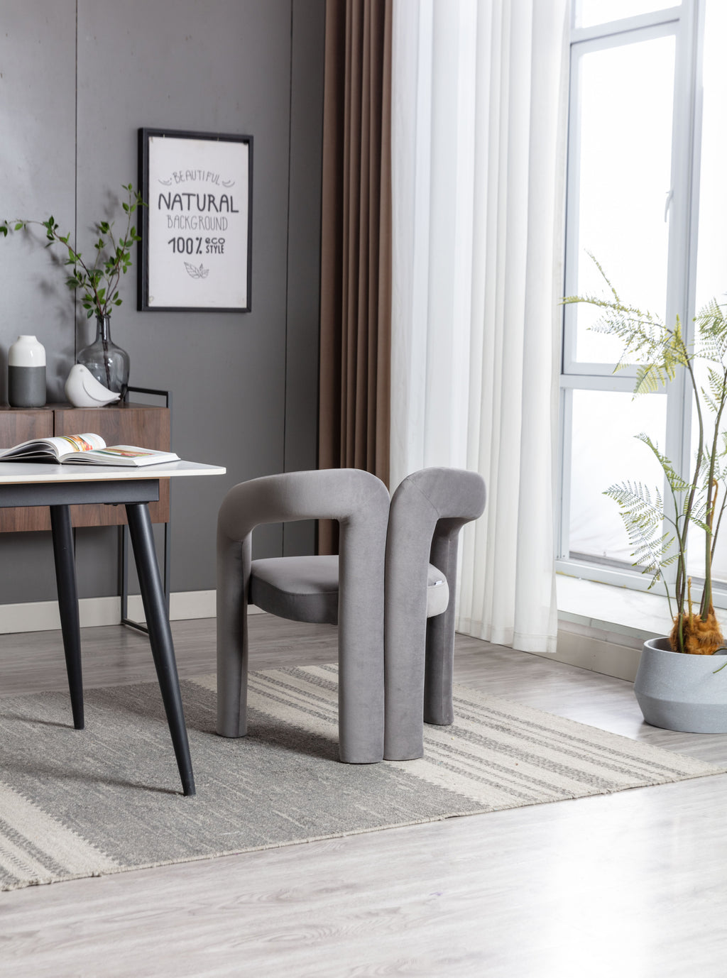 Gray velvet upholstery close-up on dining accent chair