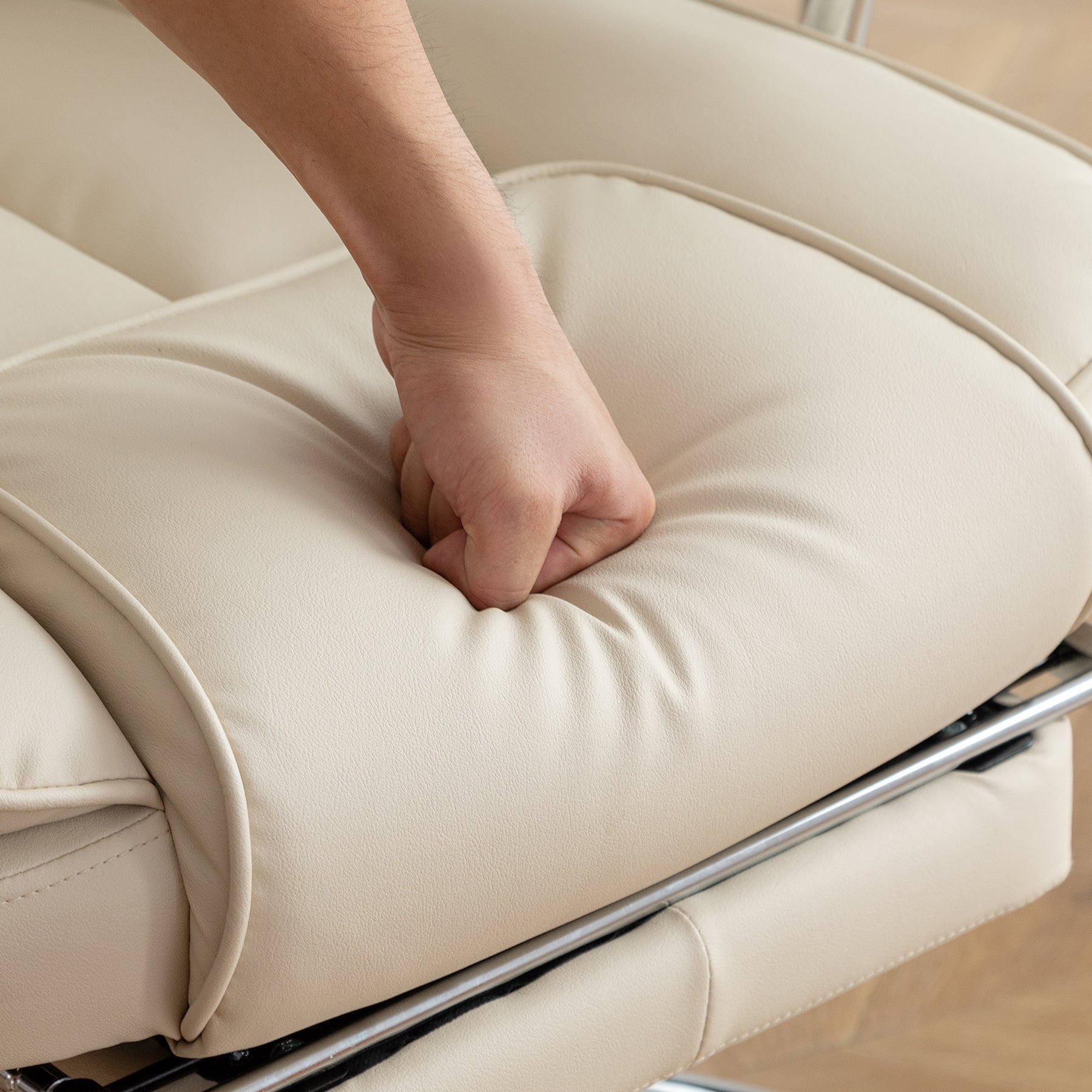 High-back ergonomic office chair side profile in beige