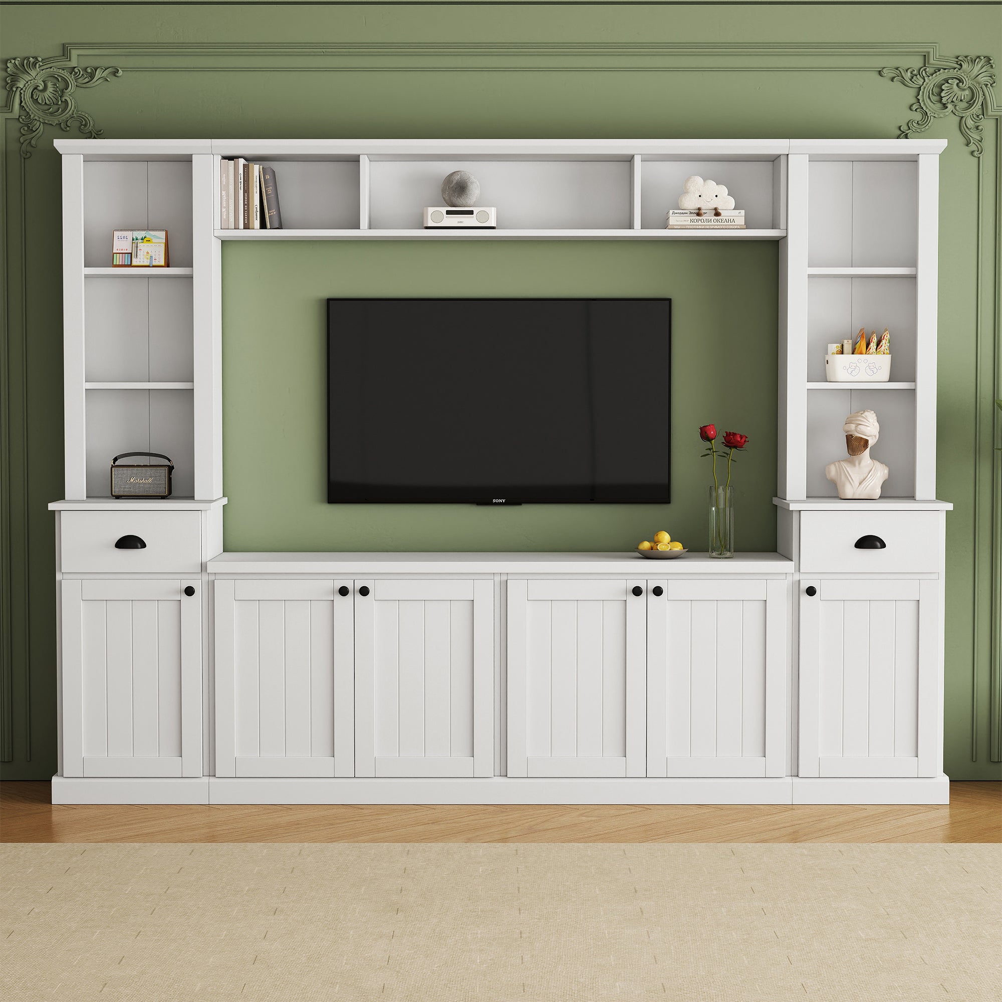 White entertainment center with left pier right pier and TV console