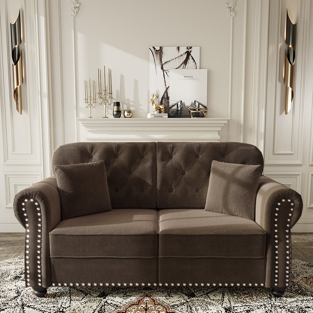 Brown velvet Chesterfield sofa with rolled arms — angle view