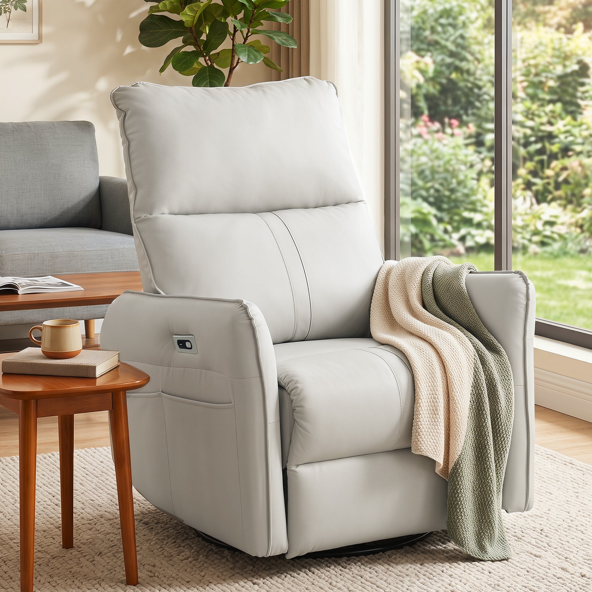 Light gray power swivel rocker recliner chair — front view