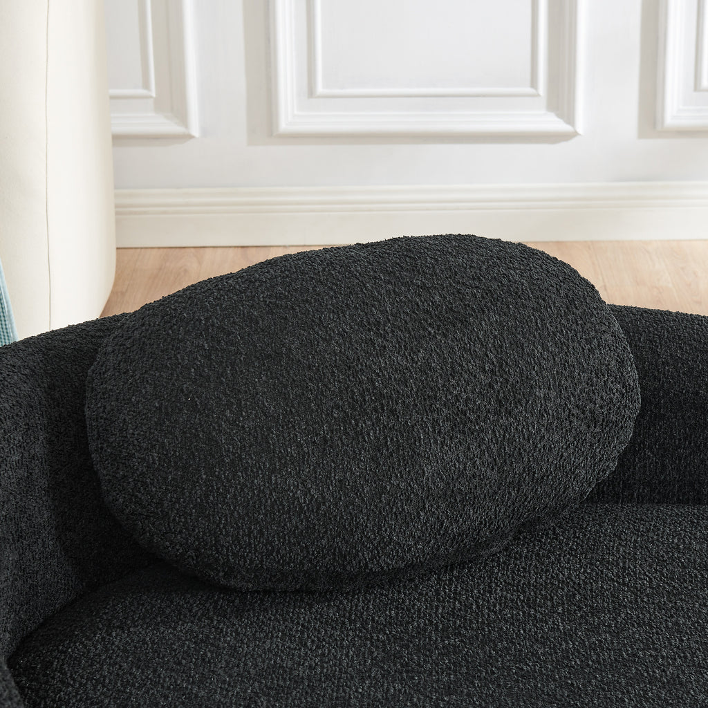 Black lazy lounge chair in narrow living room space