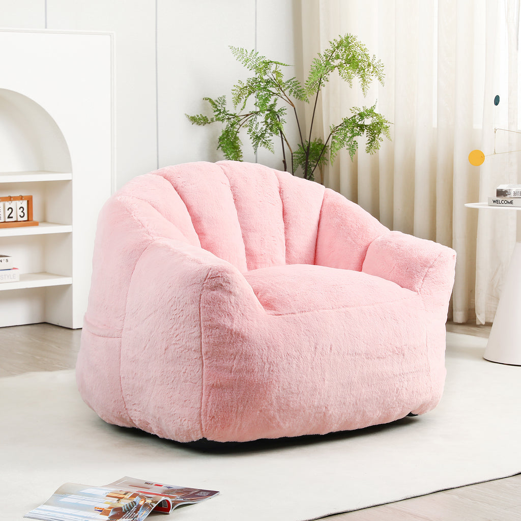 Pink bean bag lounger with armrests — angle view