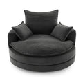 Black corduroy swivel accent chair — front view