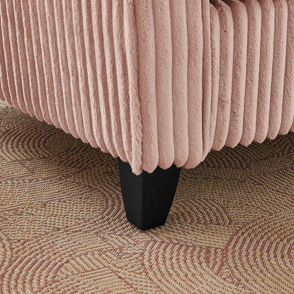 Pink lounge chair in living room setting