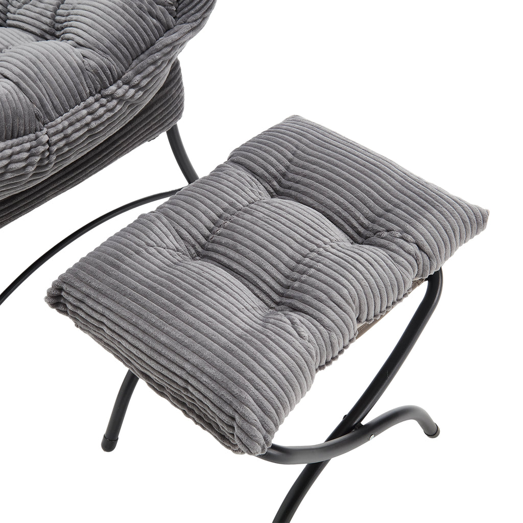 Gray lazy lounge chair with ottoman in bedroom setting