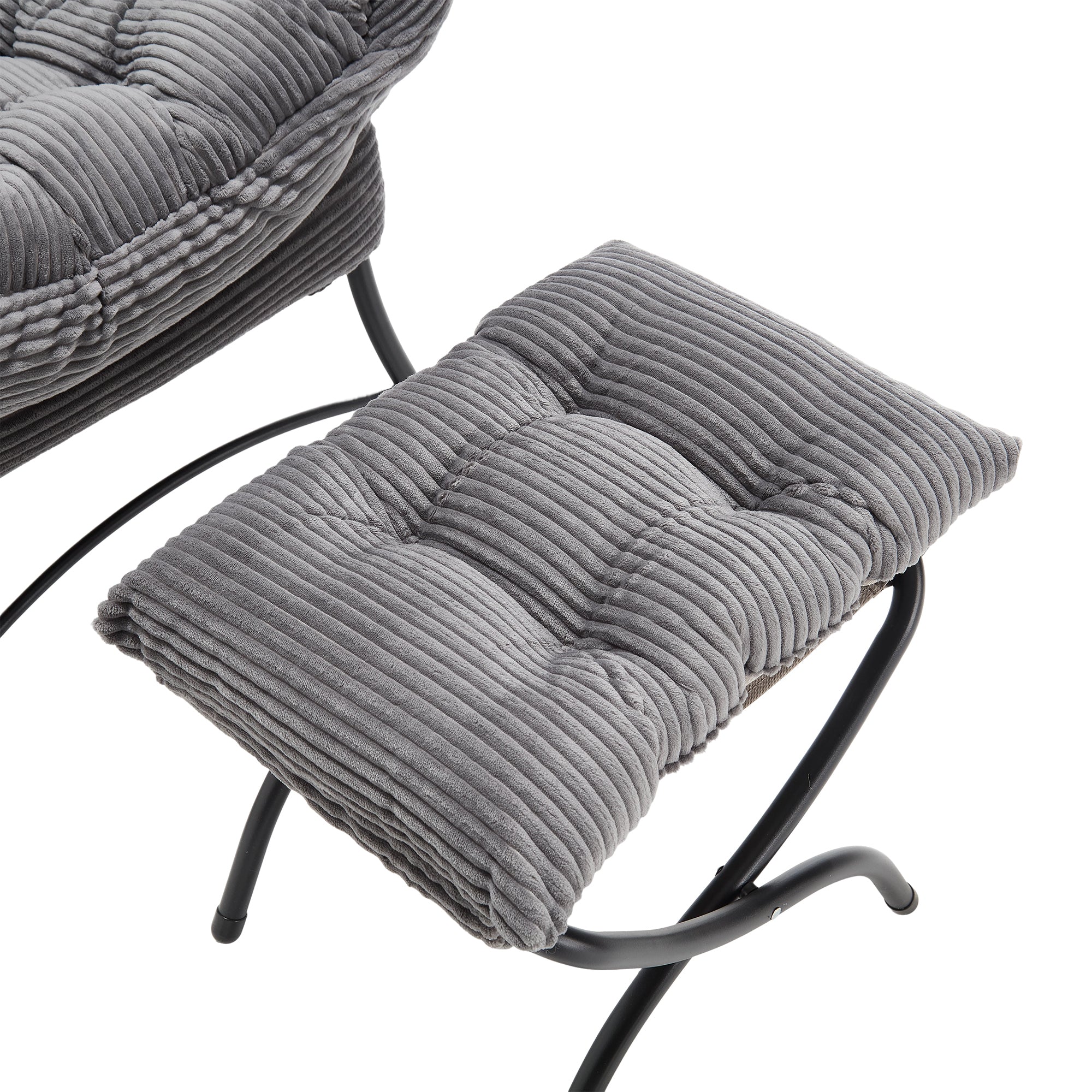 Gray lazy lounge chair with ottoman in bedroom setting