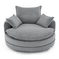 Grey corduroy swivel barrel accent chair — front view