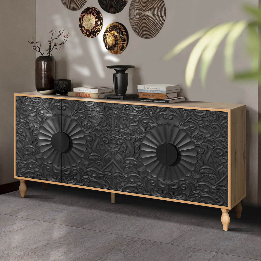 Vintage black media console with symmetrical carved doors