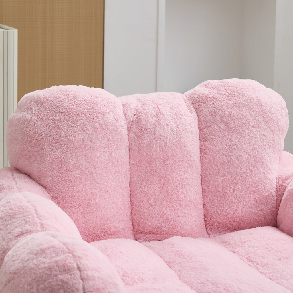 Pink floor chair upholstery texture close-up