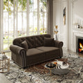 Brown velvet Chesterfield loveseat with nailhead trim — front view