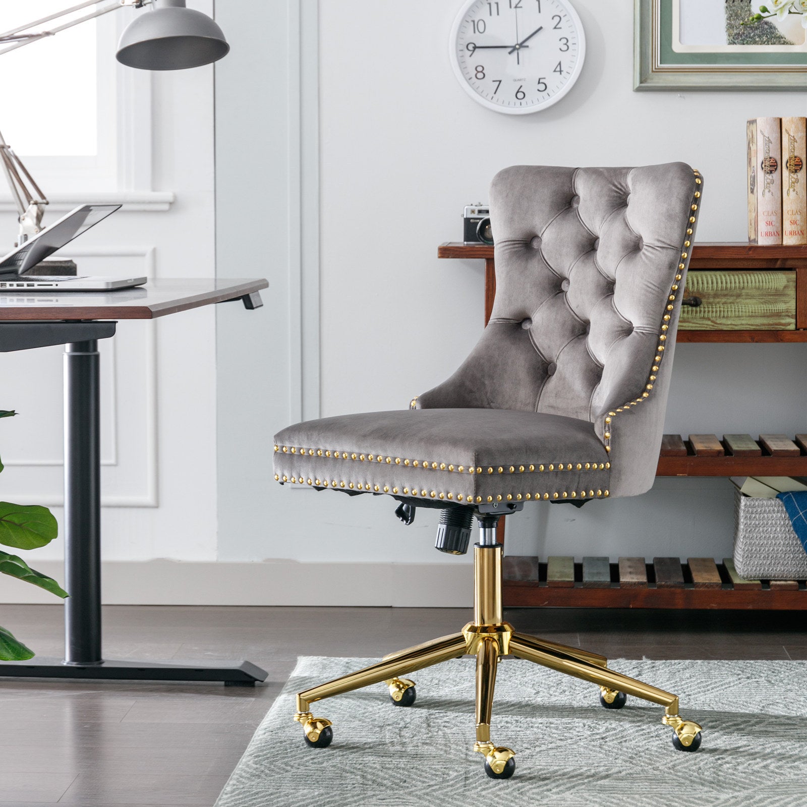 Gray button-tufted office chair angle side view
