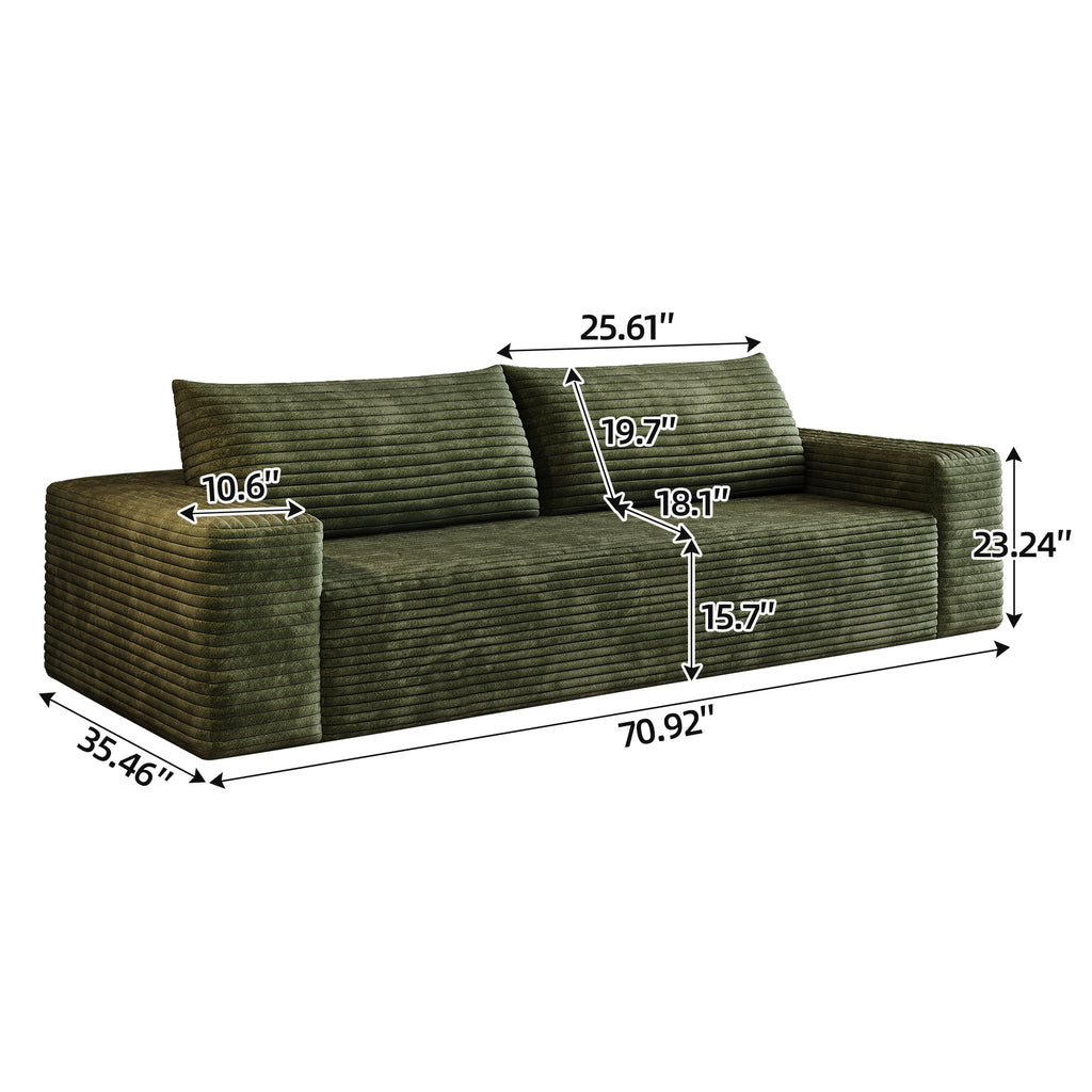 Green corduroy 3-seater sofa in living room setting