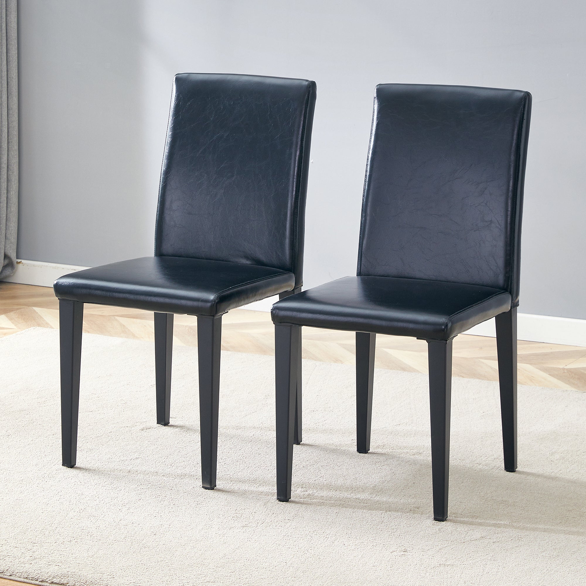 Two black PU dining chairs, simple and versatile, comfortable and accompanied. The exquisite and multifunctional dining chair has opened up a comfortable new experience. (2-piece set)W1151P263129
