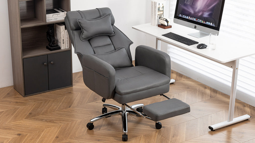 Dark grey executive office chair — profile view