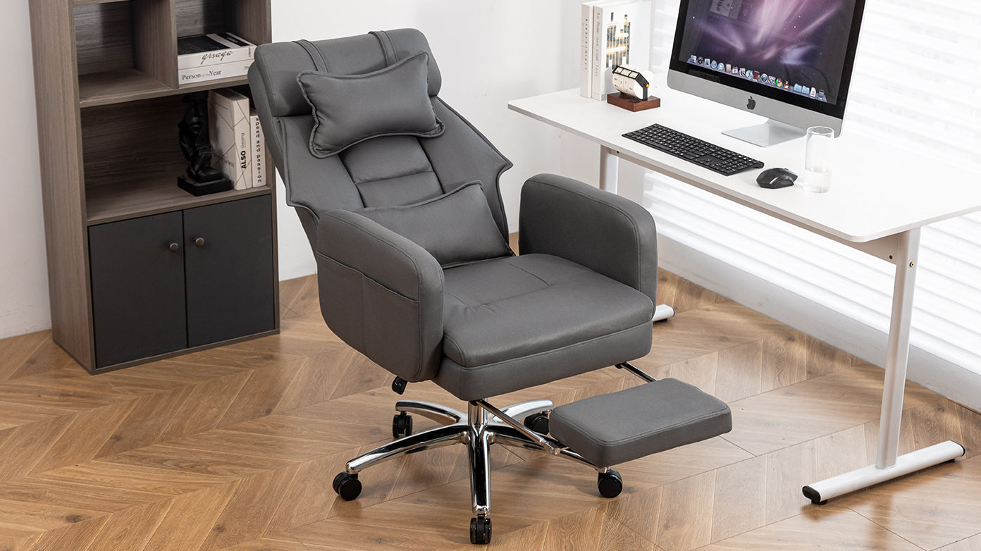 Dark grey executive office chair — profile view