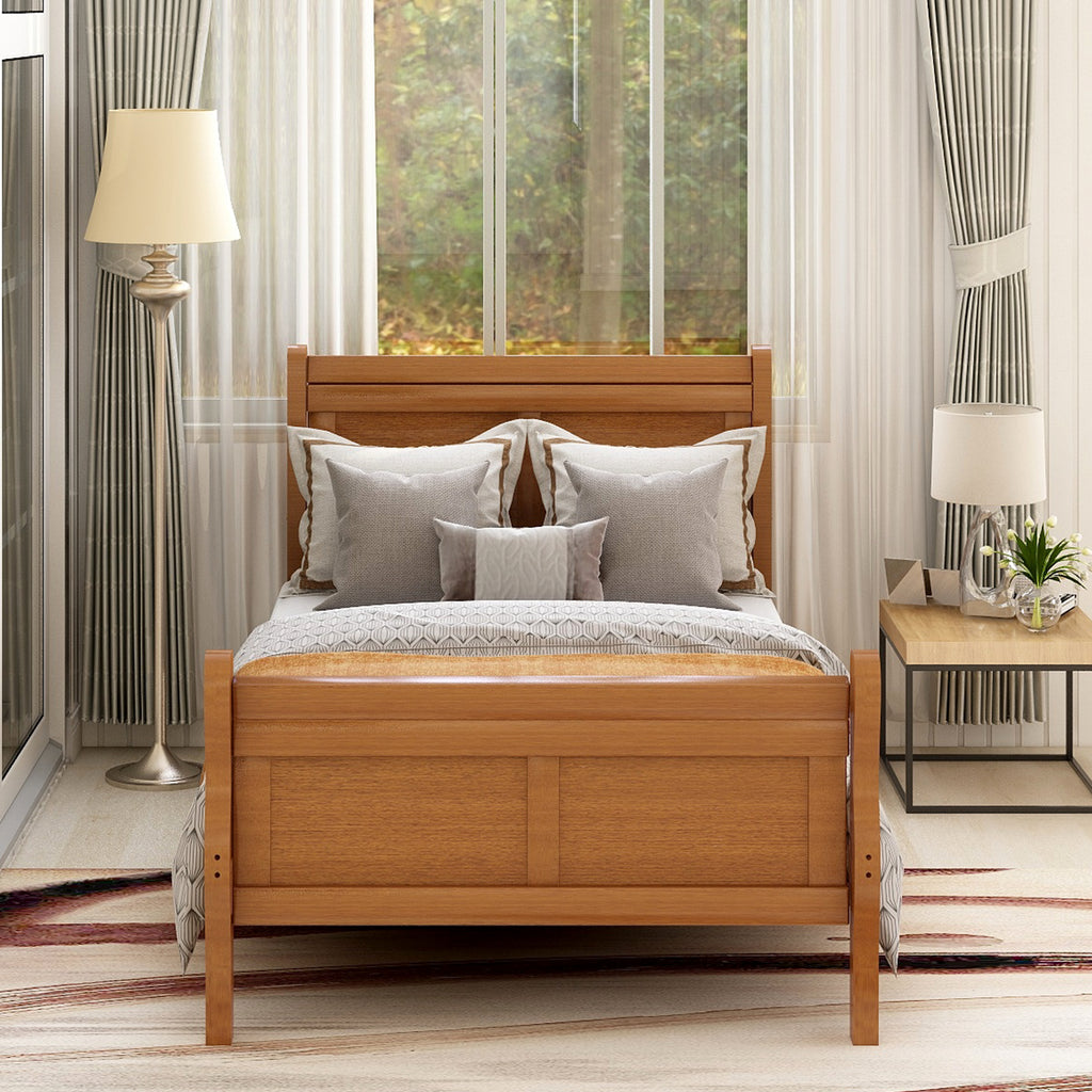 Sleigh headboard hollow design detail — oak finish
