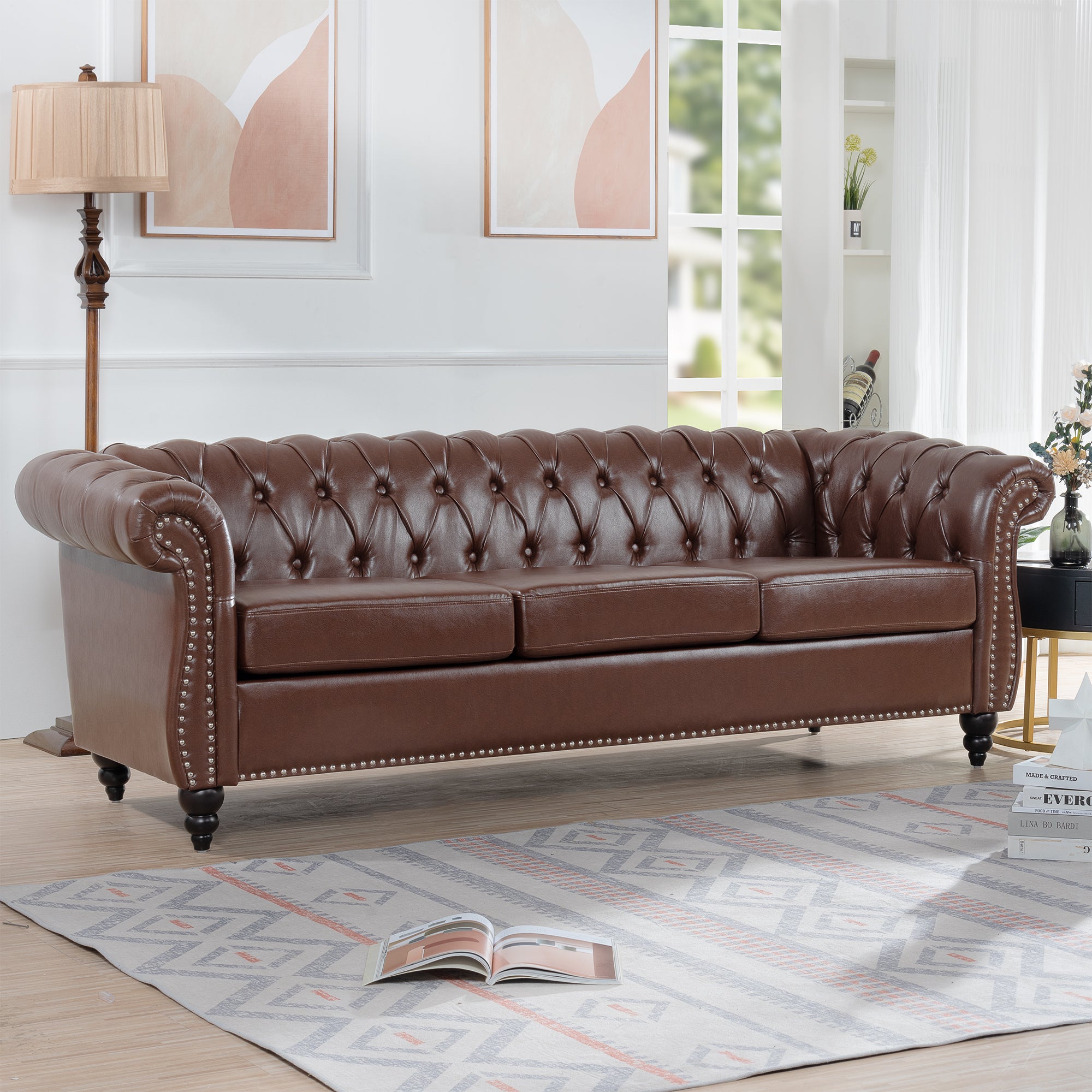 85-inch PU Chesterfield sofa with rolled arms — angle view