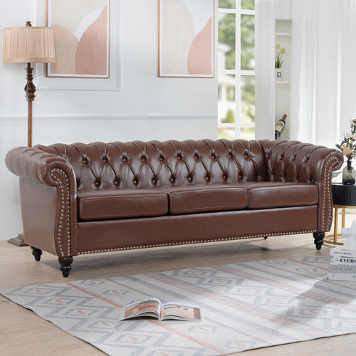 85-inch PU Chesterfield sofa with rolled arms — angle view
