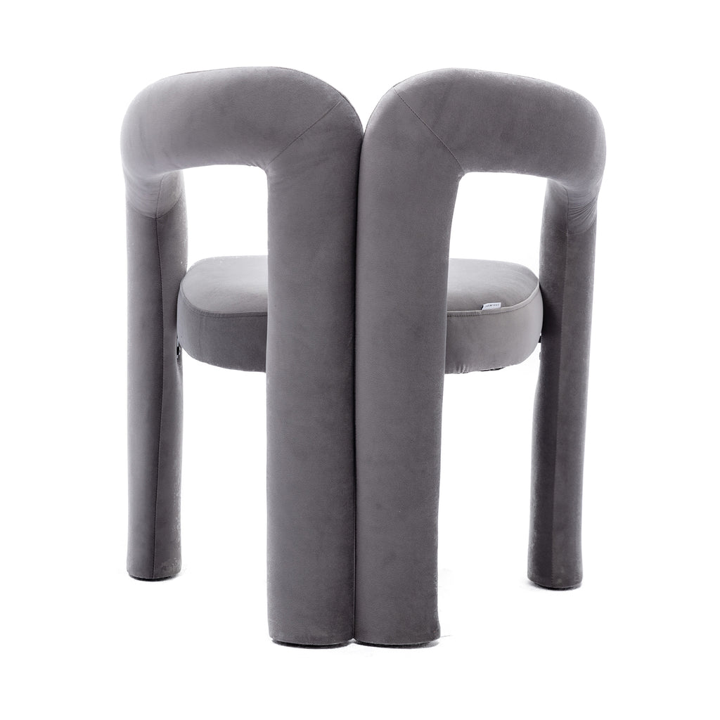 Gray velvet dining accent chair steel frame stability detail