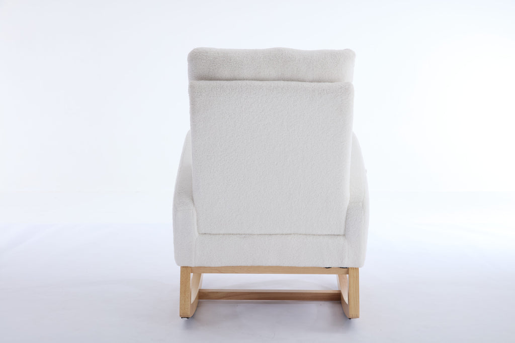 White nursery rocking chair with adjustable footrest — lifestyle
