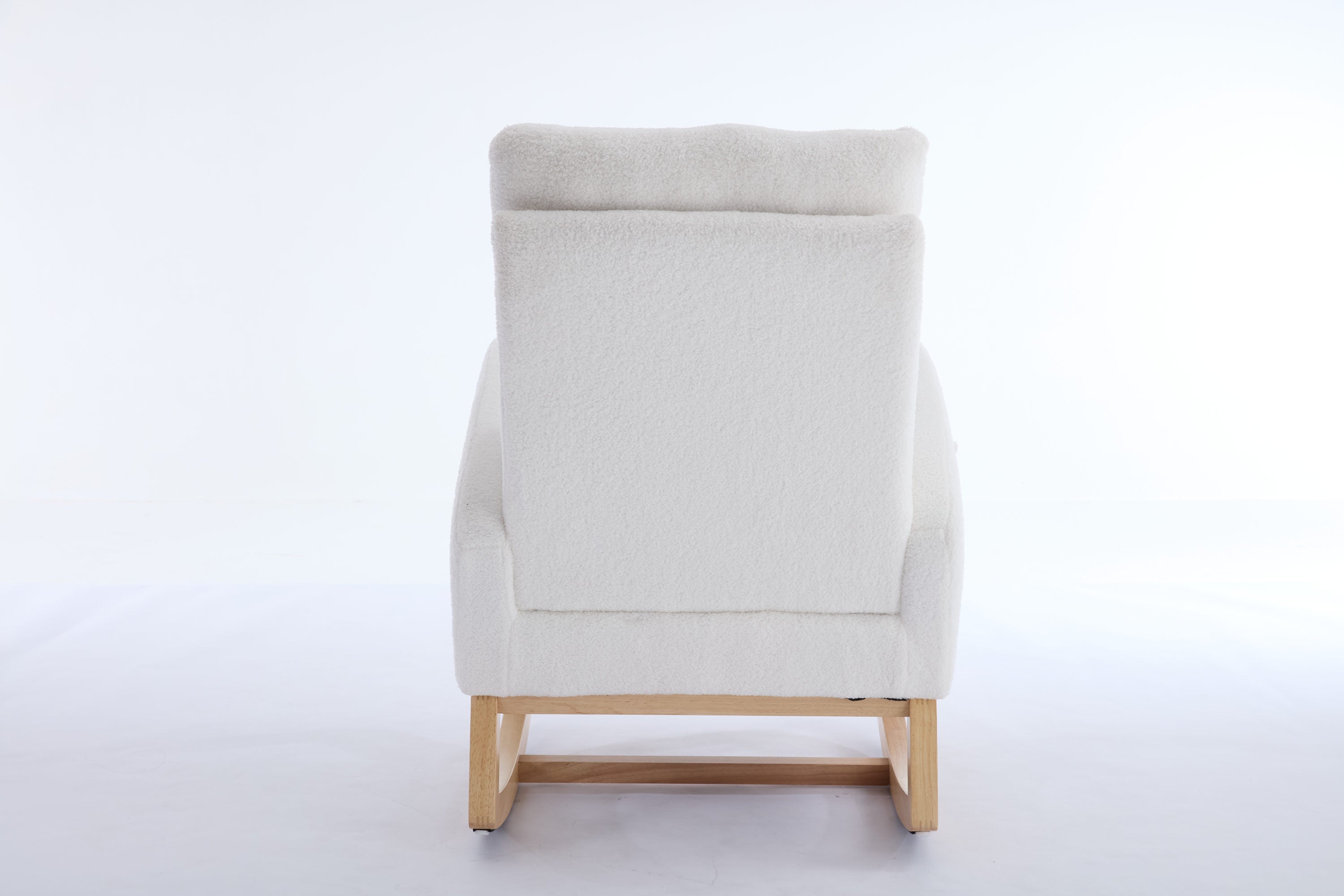White nursery rocking chair with adjustable footrest — lifestyle