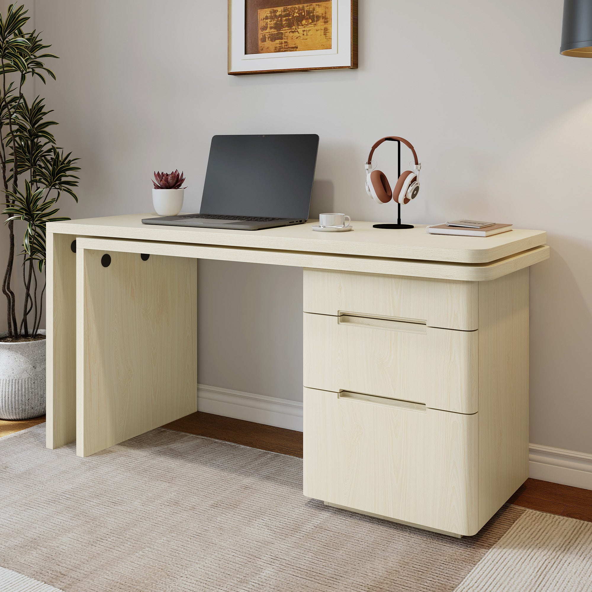 Top drawer open on natural wood executive desk